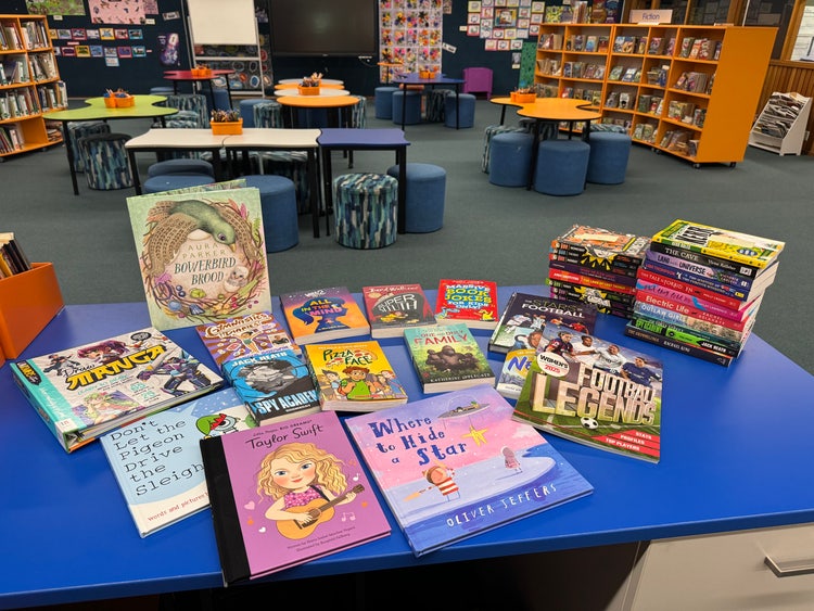 A selection of books on a table.
